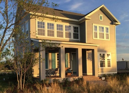 Exterior view of two-floor house with window tint