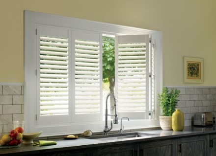 Plantation shutters over kitchen sink