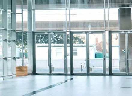 Wall-to-wall glass building lobby