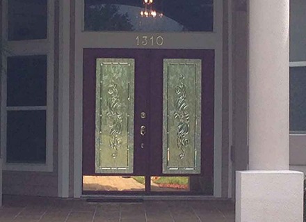 A home in Brevard County has mirror decorative film on its front door.