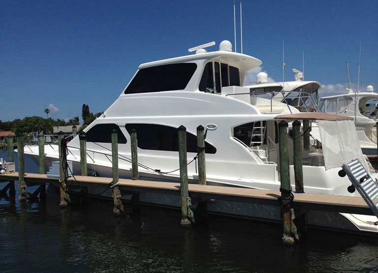 Docked yacht with tinted windows.